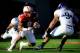 LINCOLN, NE - NOVEMBER 2: Running back Ameer Abdullah #8 of the Nebraska Cornhuskers looks for an opening around safety Jimmy Hall #9 of the Northwestern Wildcats during their game at Memorial Stadium on November 2, 2013 in Lincoln, Nebraska. (Photo by Er