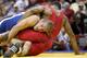 LAS VEGAS - JUNE 15: Ben Askren (blue) wrestles Tyrone Lewis (red) in the Freestyle 74kg division championship match during the USA Olympic trials for wrestling and judo on June 15, 2008 at the Thomas & Mack Center in Las Vegas, Neveda. (Photo by Jonath
