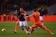 AMSTERDAM, NETHERLANDS - NOVEMBER 19: Falcao of Colombia is challenged by Kevin Strootman and Ron Vlaar of Netherlands during the International Friendly match between Netherlands and Colombia at Amsterdam ArenA on November 19, 2013 in Amsterdam, Netherla