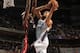 CHARLOTTE, NC - NOVEMBER 16: Jeffery Taylor #44 of the Charlotte Bobcats shoots against Joel Anthony #50 of the Miami Heat during the game at the Time Warner Cable Arena on November 16, 2013 in Charlotte, North Carolina. NOTE TO USER: User expressly ack