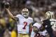 NEW ORLEANS, LA - NOVEMBER 17: Colin Kaepernick #7 of the San Francisco 49ers throws a pass against the New Orleans Saints at Mercedes-Benz Superdome on November 17, 2013 in New Orleans, Louisiana. The Saints defeated the 49ers 23-20. (Photo by Wesley