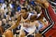Oct 30, 2013; Philadelphia, PA, USA; Philadelphia 76ers guard Evan Turner (12) is defended by Miami Heat forward Rashard Lewis (9) during the fourth quarter at Wells Fargo Center. The Sixers defeated the Heat 114-110. Mandatory Credit: Howard Smith-USA TO