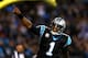 CHARLOTTE, NC - NOVEMBER 18: Cam Newton #1 of the Carolina Panthers reacts after throwing for a touchdown against the New England Patriots during their game at Bank of America Stadium on November 18, 2013 in Charlotte, North Carolina. (Photo by Streeter