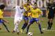 EAST RUTHERFORD, NJ - AUGUST 10: Neymar #11 and Paulo Henrique Ganso #10 of Brazil defend against Michael Bradley #4 of the U.S. in the first half of a friendly match at the New Meadowlands on August 10, 2010 in East Rutherford, New Jersey. (Photo by Je