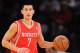 NEW YORK, NY - NOVEMBER 14: Jeremy Lin #7 of the Houston Rockets carries the ball down court during the first quarter against the New York Knicks at Madison Square Garden on November 14, 2013 in New York City. NOTE TO USER: User expressly acknowledges and