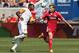 BRIDGEVIEW, IL - SEPTEMBER 01: Chris Rolfe #17 of the Chicago Fire and Kofi Sarkodie #8 of the Houston Dynamo battle for the ball during an MLS match at Toyota Park on September 1, 2013 in Bridgeview, Illinois. The Fire and the Dynamo tied 1-1. (Photo by