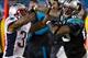 Nov 18, 2013; Charlotte, NC, USA; Carolina Panthers wide receiver Steve Smith (89) gets shoved out of bounds by New England Patriots cornerback Aqib Talib (31) during the fourth quarter at Bank of America Stadium. The Panthers defeated the Patriots 24-20.