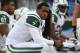 ORCHARD PARK, NY - NOVEMBER 17: Geno Smith #7 of the New York Jets looks on from the bench after throwing an interception during NFL game action against the Buffalo Bills at Ralph Wilson Stadium on November 17, 2013 in Orchard Park, New York. (Photo by To