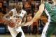 STILLWATER, OK - NOVEMBER 12: Marcus Smart #33 of the Oklahoma State Cowboys looks at the basket as Brenden Evans #20 of the Utah Valley Wolverines defends November 12, 2013 at Gallagher-Iba Arena in Stillwater, Oklahoma. The Cowboys defeated the Wolver