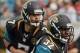 Nov 17, 2013; Jacksonville, FL, USA; Jacksonville Jaguars quarterback Chad Henne (7) hands off to running back Maurice Jones-Drew (32) in the first quarter of their game against the Arizona Cardinals at EverBank Field. Mandatory Credit: Phil Sears-USA TOD