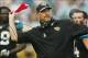 Nov 17, 2013; Jacksonville, FL, USA; Jacksonville Jaguars head coach Gus Bradley throws a challenge flag after a fumble on a punt return in the third quarter of their game against the Arizona Cardinals at EverBank Field. The Arizona Cardinals beat the Jac