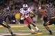 COLUMBIA, MO - OCTOBER 26: Running back Mike Davis #28 of the South Carolina Gamecocks rushes up field against pressure from defenders Braylon Webb #9 and Ian Simon #21 of the Missouri Tigers during the first half on October 26, 2013 at Faurot Field/Memo
