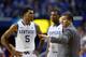 LEXINGTON, KY - NOVEMBER 17: John Calipari the head coach of the Kentucky Wildcats gives instructions to Andrew Harrison #5 and Aaron Harrison #2 during the game against the Robert Morris Colonials at Rupp Arena on November 17, 2013 in Lexington, Kentuck