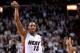 Nov 19, 2013; Miami, FL, USA; Miami Heat point guard Mario Chalmers (15) reacts after making a three point basket against the Atlanta Hawks during the second half at American Airlines Arena. Mandatory Credit: Steve Mitchell-USA TODAY Sports