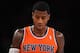 NEW YORK, NY - NOVEMBER 16: Iman Shumpert #21 of the New York Knicks looks on during the first half against the Atlanta Hawks at Madison Square Garden on November 16, 2013 in New York City. The Hawks defeat the Knicks 110-90. NOTE TO USER: User expressly