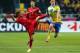 STOCKHOLM, SWEDEN - NOVEMBER 19: Mikael Lustig (R) of Sweden battles for the ball with Fabio Coentrao of Portugal during the FIFA 2014 World Cup Qualifier Play-off Second Leg match between Sweden and Portugal at Friends Arena on November 19, 2013 in Stock