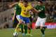 DUBLIN, IRELAND - SEPTEMBER 06: Zlatan Ibrahimovic of Republic of Ireland battles with Marc Wilson of Sweden during the FIFA 2014 World Cup Qualifying Group C match between Republic of Ireland and Sweden at Aviva Stadium on September 6, 2013 in Dublin, I