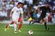 WELLINGTON, NEW ZEALAND - NOVEMBER 20: Marco Rojas of New Zealand makes a break during leg 2 of the FIFA World Cup Qualifier match between the New Zealand All Whites and Mexico at Westpac Stadium on November 20, 2013 in Wellington, New Zealand. (Photo b