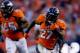 DENVER, CO - OCTOBER 27: Running back Knowshon Moreno #27 of the Denver Broncos runs for a 35-yard touchdown after making a reception during the fourth quarter against the Washington Redskins at Sports Authority Field Field at Mile High on October 27, 20