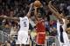 Nov 13, 2013; Orlando, FL, USA; Milwaukee Bucks shooting guard O.J. Mayo (00) gets doubled teamed by Orlando Magic shooting guard Victor Oladipo (5) and power forward Kyle O'Quinn (2) during the second half at Amway Center. Orlando Magic defeated the Milw