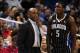 Nov 8, 2013; Orlando, FL, USA; Orlando Magic head coach Jacque Vaughn talks with shooting guard Victor Oladipo (5) during a timeout as the Boston Celtics beat the Orlando Magic 91-89 at Amway Center. Mandatory Credit: David Manning-USA TODAY Sports