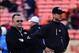 August 30, 2012; San Francisco, CA, USA; San Francisco 49ers offensive coordinator Greg Roman (left) and head coach Jim Harbaugh (right) watch before the game against the San Diego Chargers at Candlestick Park. Mandatory Credit: Kyle Terada-USA TODAY Spor
