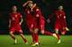BELFAST, NORTHERN IRELAND - SEPTEMBER 06: Cristiano Ronaldo of Portugal celebrates scoring with team mate Joao Periera during the FIFA 2014 World Cup Qualifying Group F match between Northern Ireland and Portugal at Windsor Park on September 6, 2013 in B