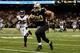 NEW ORLEANS, LA - NOVEMBER 11: Jimmy Graham #80 of the New Orleans Saints runs past William Moore #25 of the Atlanta Falcons at The Mercedes-Benz Superdome on November 11, 2012 in New Orleans, Louisiana. The Saints defeated the Falcons 31-27. (Photo