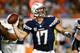 MIAMI GARDENS, FL - NOVEMBER 17: Philip Rivers #17 of the San Diego Chargers drops back to pass uring their game against the Miami Dolphins at Sun Life Stadium on November 17, 2013 in Miami Gardens, Florida. (Photo by Streeter Lecka/Getty Images)