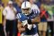 Nov 10, 2013; Indianapolis, IN, USA; Indianapolis Colts running back Trent Richardson (34) runs the ball during the third quarter against the St. Louis Rams at Lucas Oil Stadium. The Rams won 38-8. Mandatory Credit: Pat Lovell-USA TODAY Sports