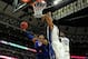 CHICAGO, IL - NOVEMBER 12: Frank Mason #0 of the Kansas Jayhawks shoots against Amile Jefferson #21 and Jabari Parker #1 of the Duke Blue Devils during the State Farm Champions Classic at the United Center on November 12, 2013 in Chicago, Illinois. Kansa