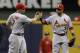 MILWAUKEE, WI - MAY 02: Carlos Beltran #3 of the St. Louis Cardinals celebrates with Matt Holliday #7 after the 6-5 win over the Milwaukee Brewers during the game at Miller Park on May 02, 2013 in Milwaukee, Wisconsin. (Photo by Mike McGinnis/Getty Images