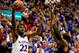 LAWRENCE, KS - NOVEMBER 08: Andrew Wiggins #22 of the Kansas Jayhawks shoots during the game against the Louisiana Monroe Warhawks at Allen Fieldhouse on November 8, 2013 in Lawrence, Kansas. (Photo by Jamie Squire/Getty Images)