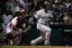 HOUSTON, TX - SEPTEMBER 28: Robinson Cano #24 of the New York Yankees hits a single in the sixth inning against the Houston Astros at Minute Maid Park on September 28, 2013 in Houston, Texas. (Photo by Scott Halleran/Getty Images)