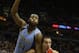 MILWAUKEE, WI - NOVEMBER 16: Marquette Golden Eagles Davante Gadner #54 of the Marquette Golden Eagles drives against Aaron Craft #4 of the Ohio State Buckeyes during a basketball game at BMO Harris Bradley Center on November 16, 2013 in Milwaukee, Wisco