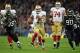 Oct 27, 2013; London, UNITED KINGDOM; San Francisco 49ers quarterback Colin Kaepernick (7) scrambles with the ball against the Jacksonville Jaguars during an International Series game at Wembley Stadium. Mandatory Credit: Bob Martin-USA TODAY Sports