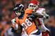 DENVER, CO - NOVEMBER 17: Demaryius Thomas #88 of the Denver Broncos completes a first down reception against the defense of Marcus Cooper #31 of the Kansas City Chiefs in the second quarter at Sports Authority Field at Mile High on November 17, 2013 in