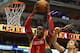 DALLAS, TX - NOVEMBER 20: Dwight Howard #12 of the Houston Rockets grabs a rebound against Dirk Nowitzki #41 of the Dallas Mavericks at American Airlines Center on November 20, 2013 in Dallas, Texas. NOTE TO USER: User expressly acknowledges and agrees