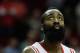 HOUSTON, TX - NOVEMBER 11: James Harden #13 of the Houston Rockets waits under the basket as time winds down in the second overtime period during the game against the Toronto Raptors at Toyota Center on November 11, 2013 in Houston, Texas. NOTE TO USER: