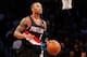 Nov 18, 2013; Brooklyn, NY, USA; Portland Trail Blazers point guard Damian Lillard (0) advances the ball during the second quarter against the Brooklyn Nets at Barclays Center. Mandatory Credit: Anthony Gruppuso-USA TODAY Sports