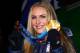 WHISTLER, BC - FEBRUARY 20: Lindsey Vonn of the United States receives the bronze medal during the medal ceremony for the women's super-g alpine skiing held at the Whistler Medals Plaza on day 9 of the Vancouver 2010 Winter Olympics at Whistler Medals Pl