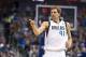 Oct 30, 2013; Dallas, TX, USA; Dallas Mavericks power forward Dirk Nowitzki (41) motions to shooting guard Monta Ellis (not pictured) after making a three point shot against the Atlanta Hawks during the first quarter at American Airlines Center. Mandatory