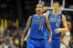 Nov 6, 2013; Oklahoma City, OK, USA; Dallas Mavericks shooting guard Monta Ellis (11) and power forward Dirk Nowitzki (41) react to a call in action against the Oklahoma City Thunder during the fourth quarter at Chesapeake Energy Arena. Mandatory Credit: