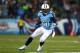 NASHVILLE, TN - NOVEMBER 14: Chris Johnson #28 of the Tennessee Titans carries the ball against the Indianapolis Colts in the second quarter at LP Field on November 14, 2013 in Nashville, Tennessee. (Photo by Andy Lyons/Getty Images)