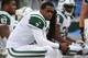 ORCHARD PARK, NY - NOVEMBER 17: Geno Smith #7 of the New York Jets looks on from the bench after throwing an interception during NFL game action against the Buffalo Bills at Ralph Wilson Stadium on November 17, 2013 in Orchard Park, New York. (Photo by To