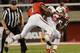 SALT LAKE CITY, UT - OCTOBER 12: Ty Montgomery #7 of the Stanford Cardinal catches a pass as he is hit by Keith McGill #1 of the Utah Utes during the second half of an NCAA football game October 12, 2013 at Rice Eccles Stadium in Salt Lake City, Utah. Uta