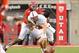 Oct 12, 2013; Salt Lake City, UT, USA; Stanford Cardinal quarterback Kevin Hogan (8) fumbles as he is hit by Utah Utes defensive end Nate Orchard (8) during the second half at Rice-Eccles Stadium. Utah defeated Stanford 27-21. Mandatory Credit: Russ Isabe