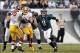 Nov 17, 2013; Philadelphia, PA, USA; Philadelphia Eagles quarterback Nick Foles (9) scrambles during the fourth quarter against the Washington Redskins at Lincoln Financial Field. The Eagles defeated the Redskins 24-16. Mandatory Credit: Howard Smith-USA