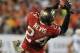 TAMPA, FL - NOVEMBER 11: Cornerback Darrelle Revis #24 of the Tampa Bay Buccaneers stretches for a 4th-quarter interception against the Miami Dolphins November 11, 2013 at Raymond James Stadium in Tampa, Florida. Tampa won 22 - 19. (Photo by Al Messersch