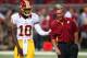 ST. LOUIS, MO - SEPTEMBER 16: Robert Griffin III #10 of the Washington Redskins jokes with head coach Mike Shanahan also of the Washington Redskins during pre-game warm ups prior to playing against the St. Louis Rams at the Edward Jones Dome on September